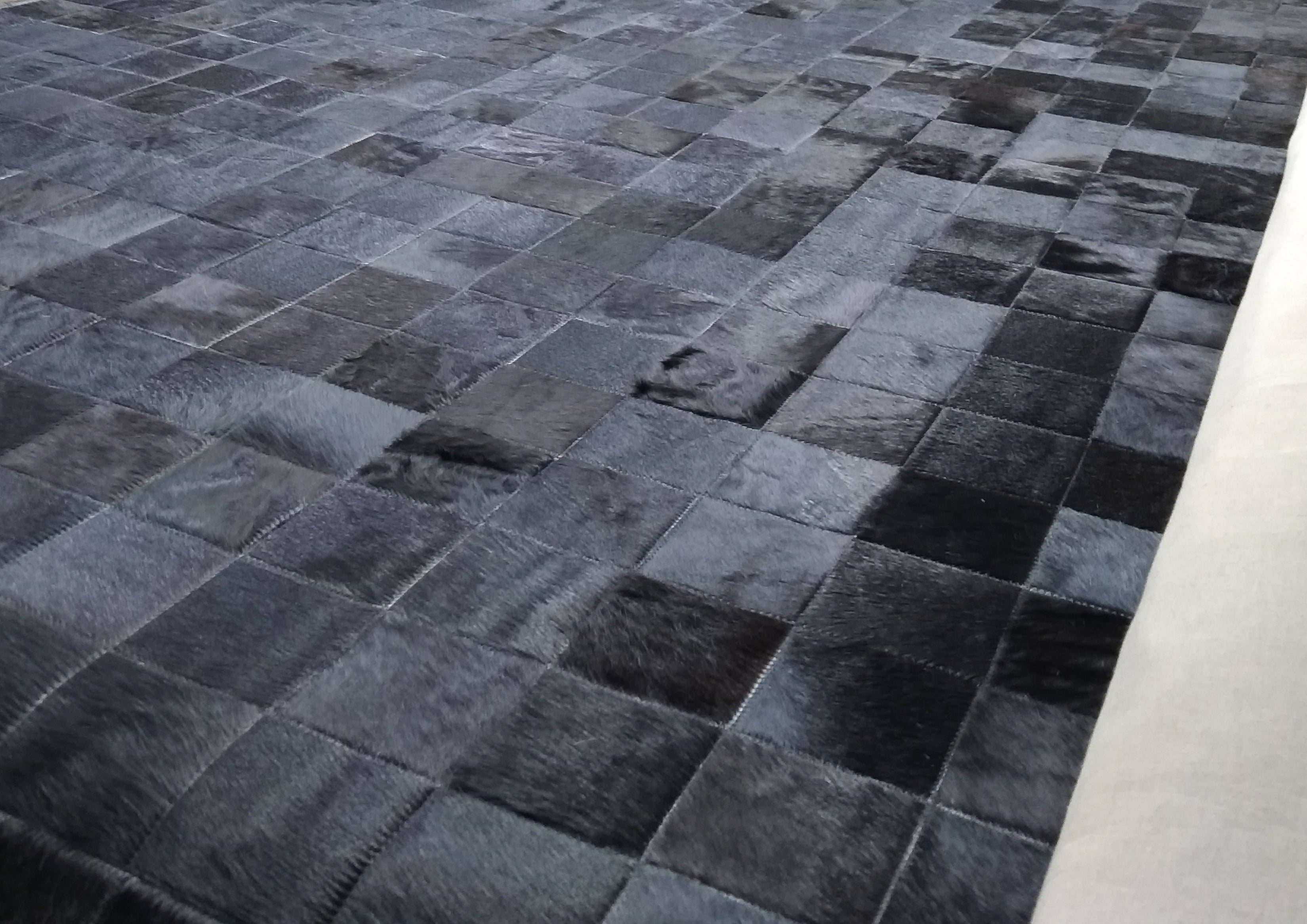 Solid Black Block Cowhide Patchwork Rug