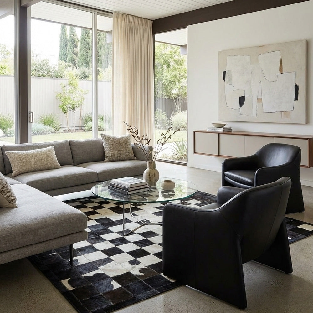 cowhide patchwork rug in chess block pattern in black and white