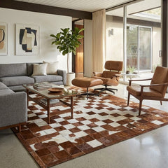 cowhide patchwork rug in block pattern in modern living room