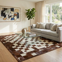 cowhide patchwork rug in block pattern in modern living room