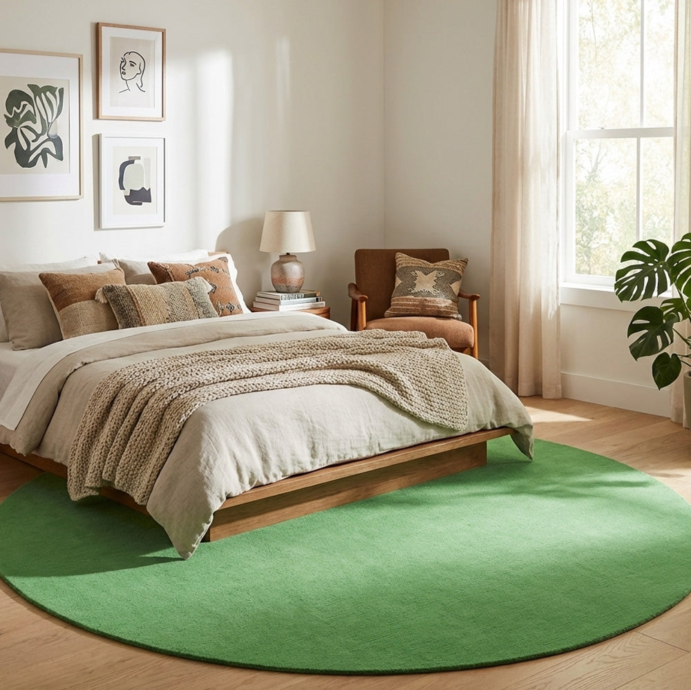 Mint green round wool rug in modern bedroom