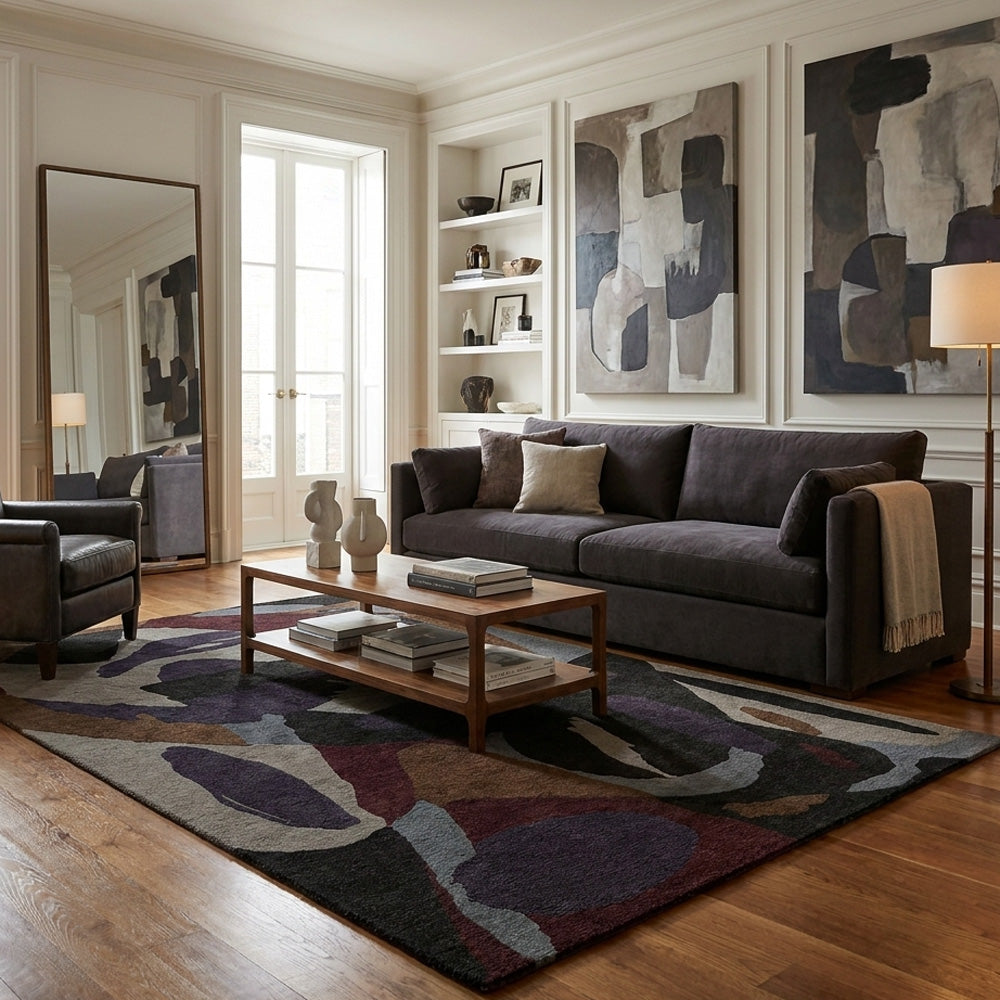 Clay Forms hand-tufted NZ wool rug with organic abstract shapes in charcoal, grey, ivory, brown, plum and burgundy tones.