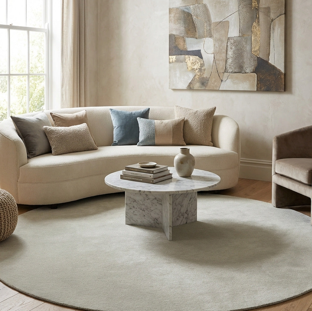 Light grey round wool rug in modern living room