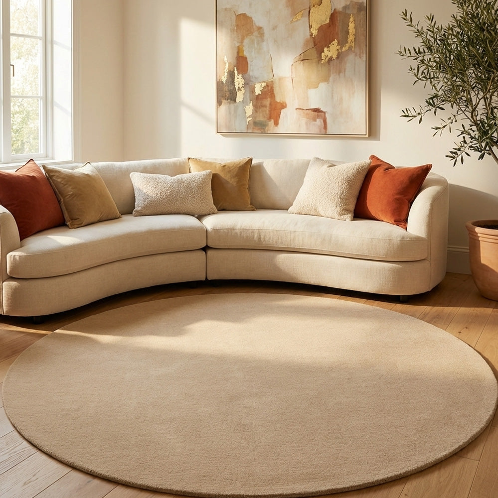 Beige round wool rug in modern living room