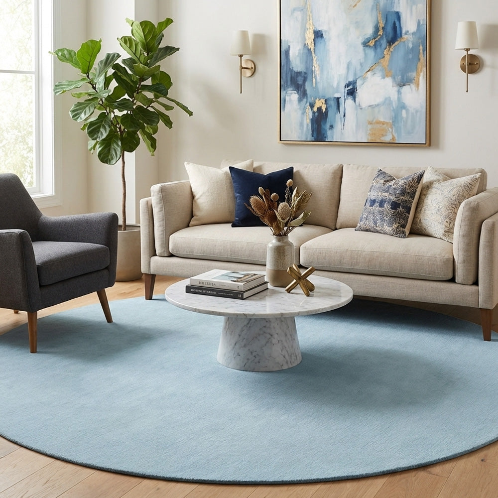 Light blue round wool rug in modern living room