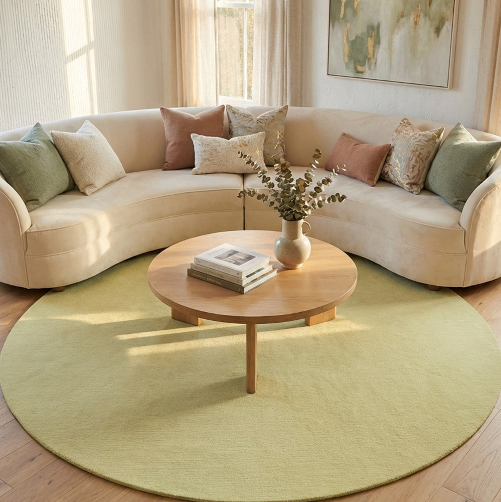 Green round wool rug in modern living room