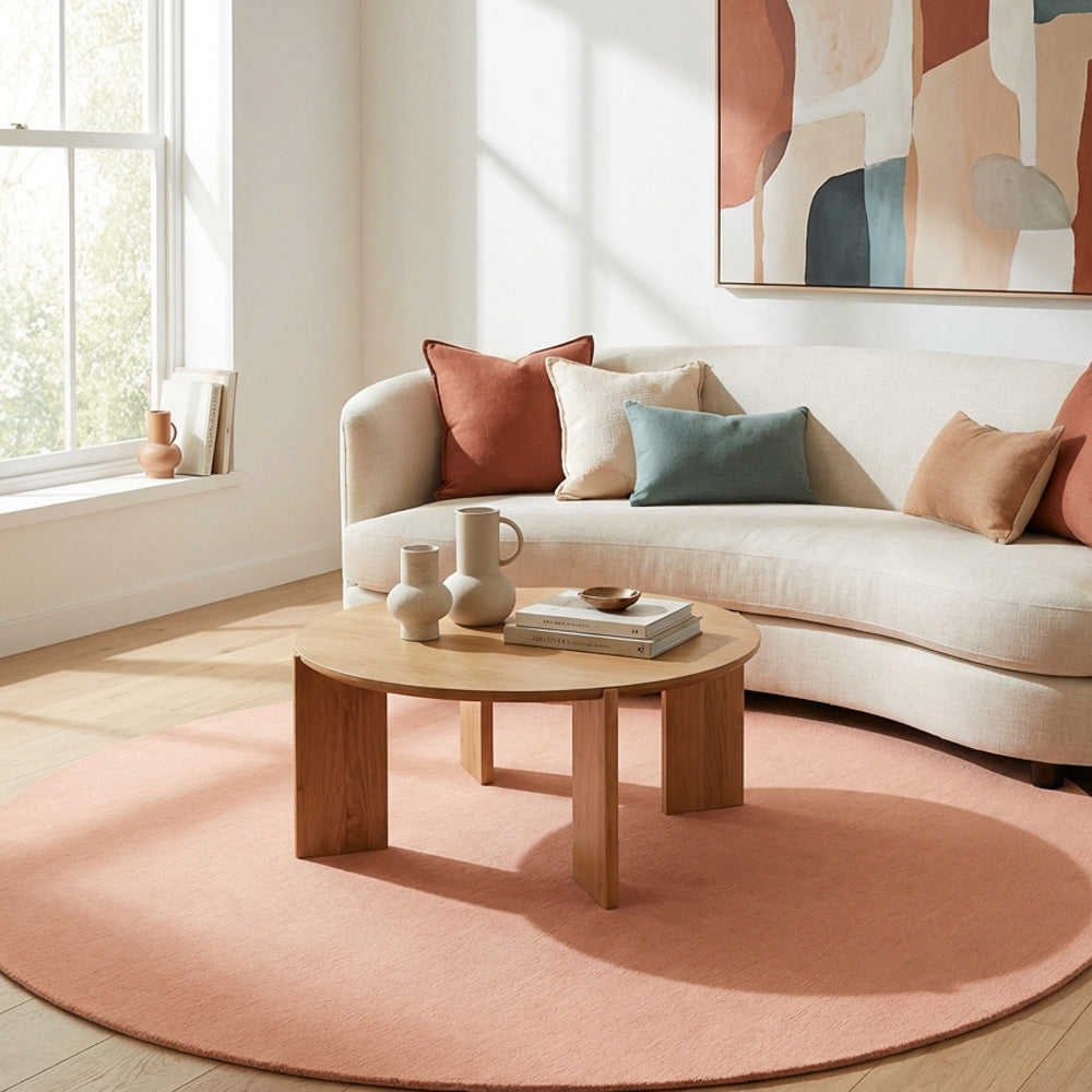 Natural pink round wool rug in modern style living room
