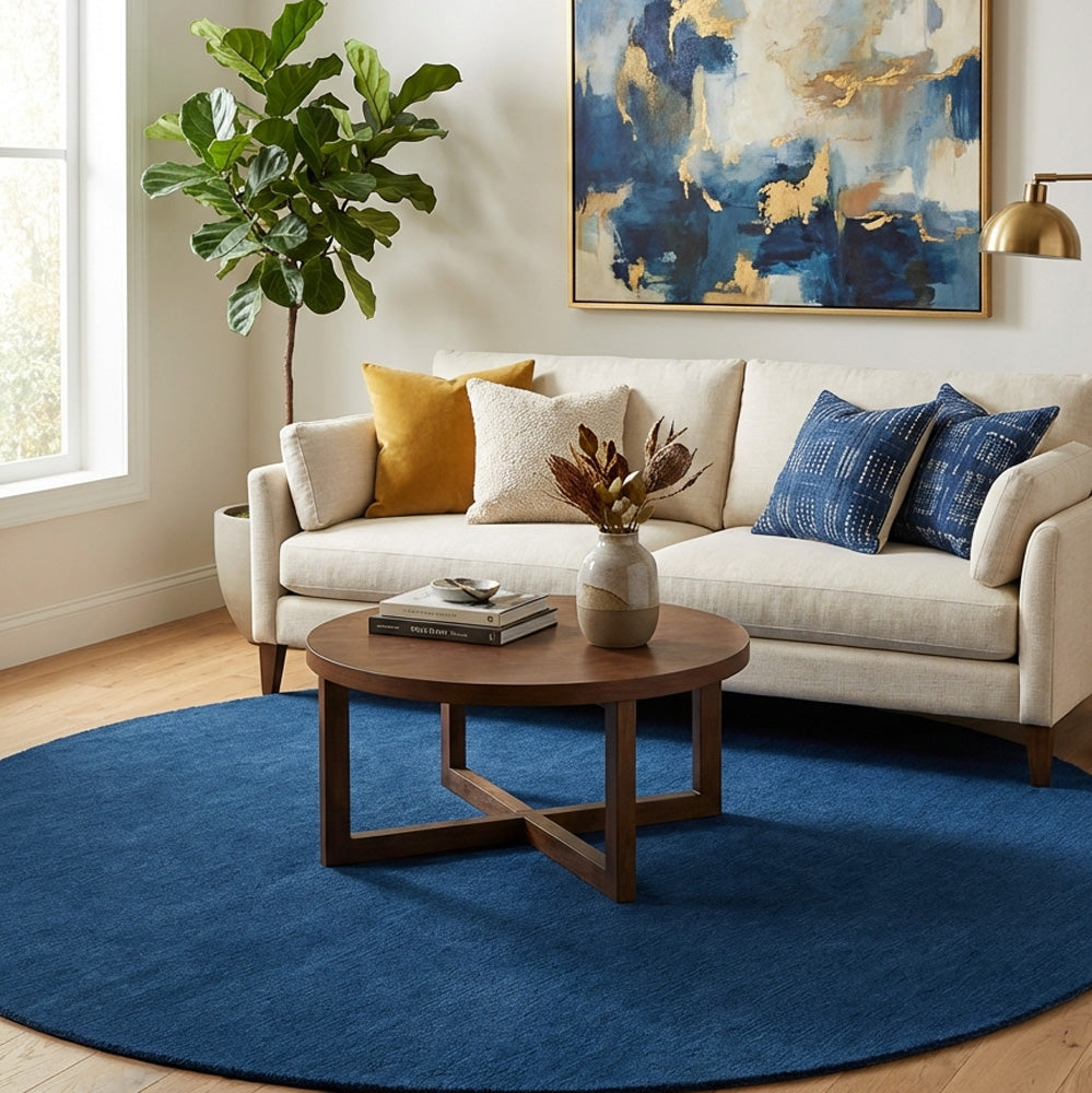 Hand tufted neon blue round wool rug in modern living room