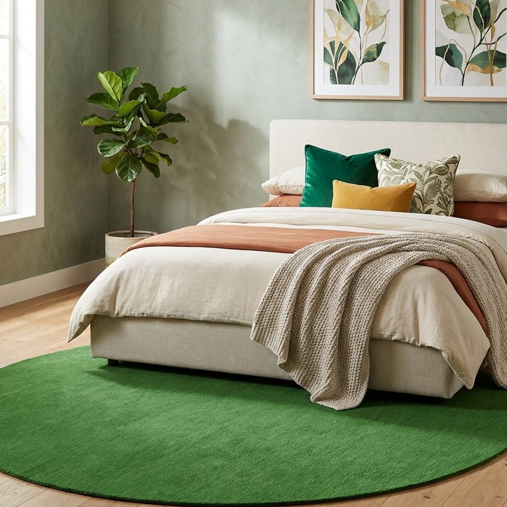 Forest green round wool rug in modern bedroom