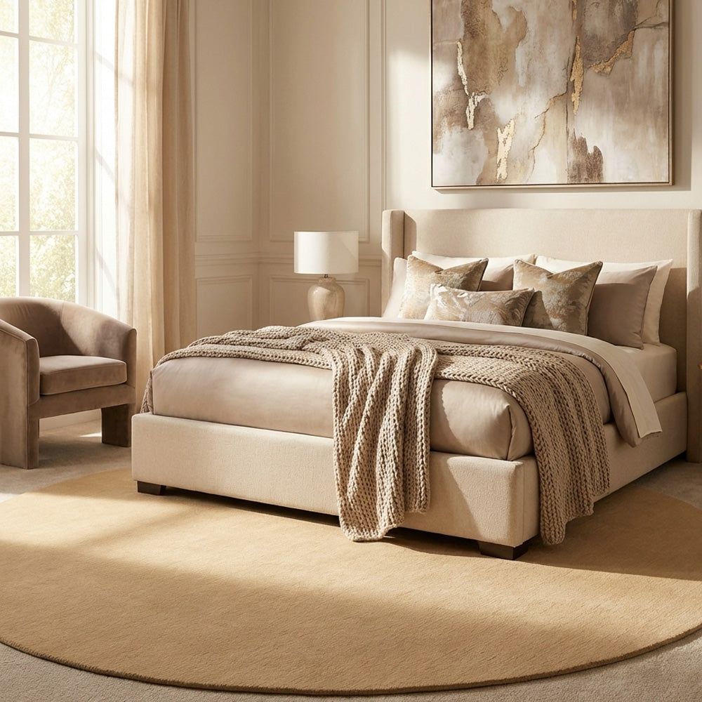 beige wool rug round in modern bedroom