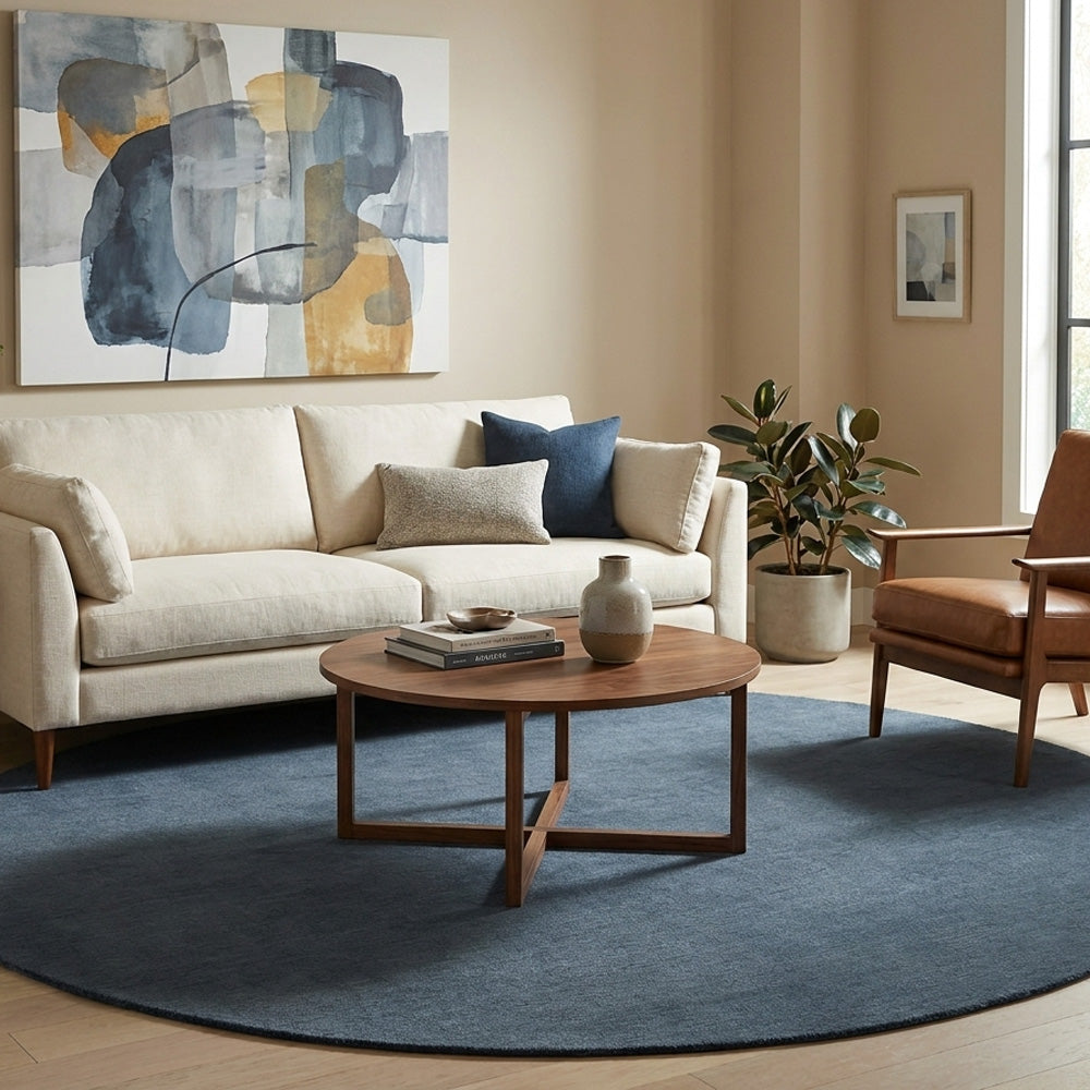 Dark grey round wool rug in modern living room