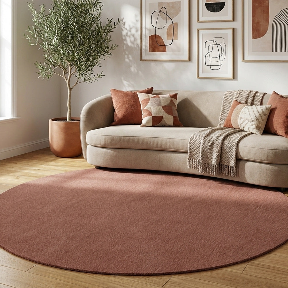 Brownish round wool rug in living room
