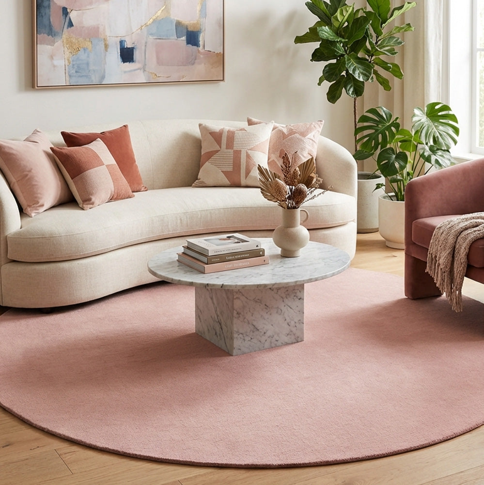 Pink round wool rug in modern living room