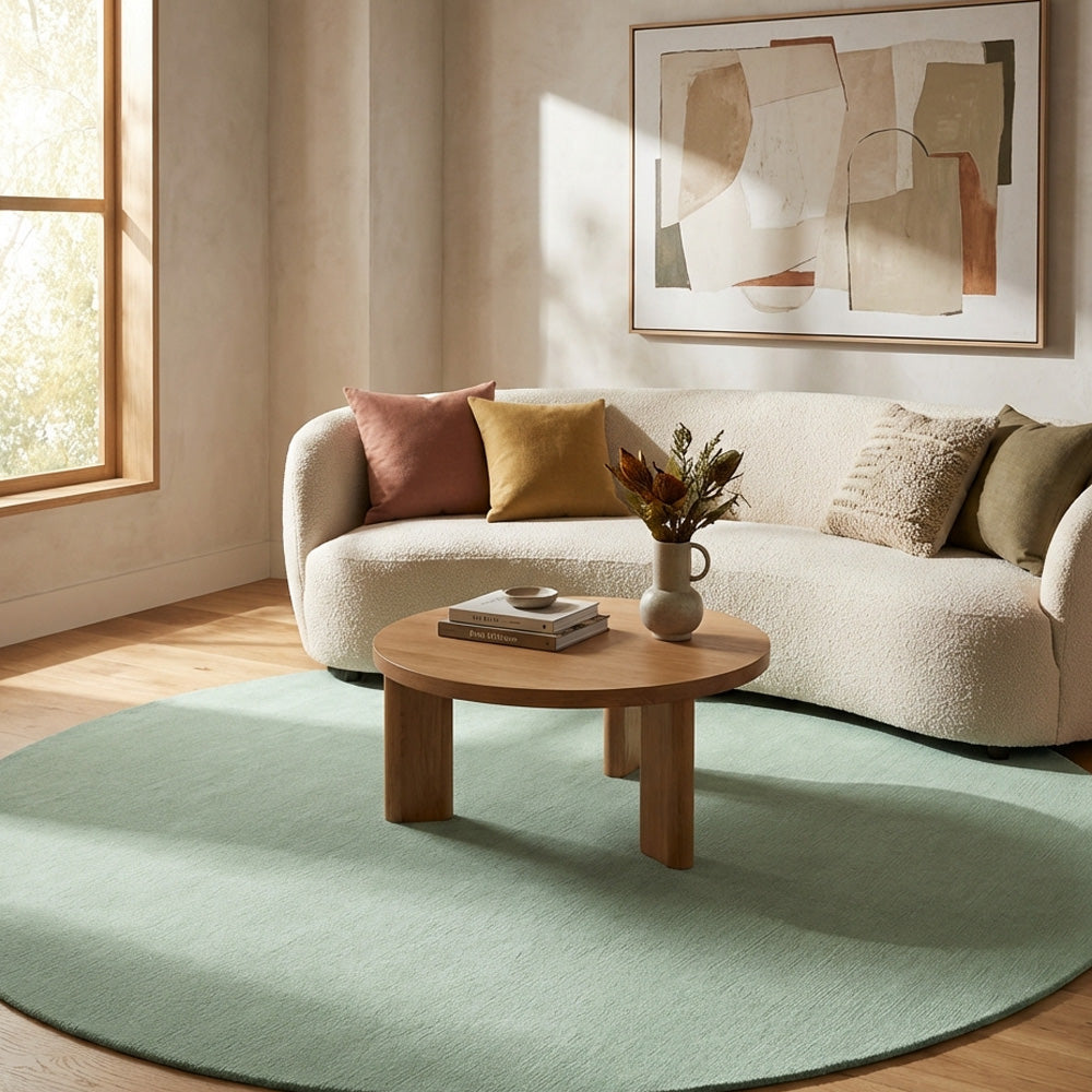Natural round wool rug in living room
