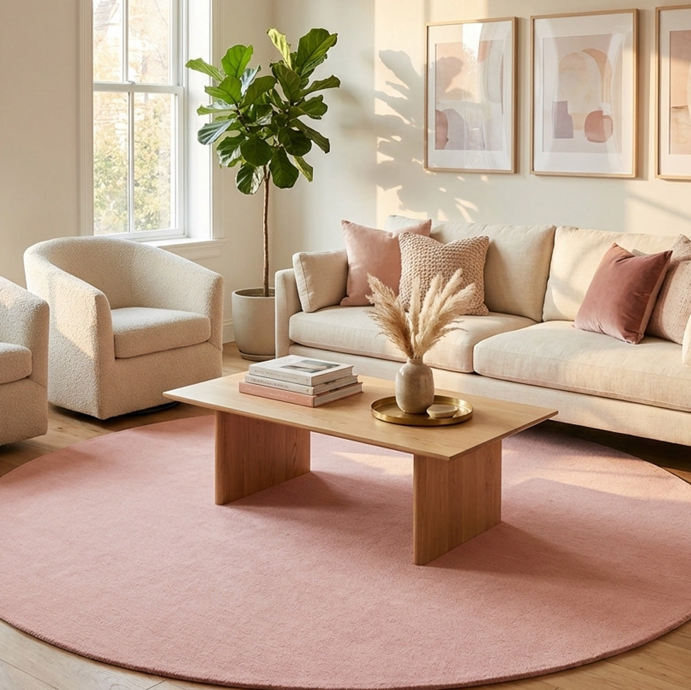 pink round wool rug in modern living room