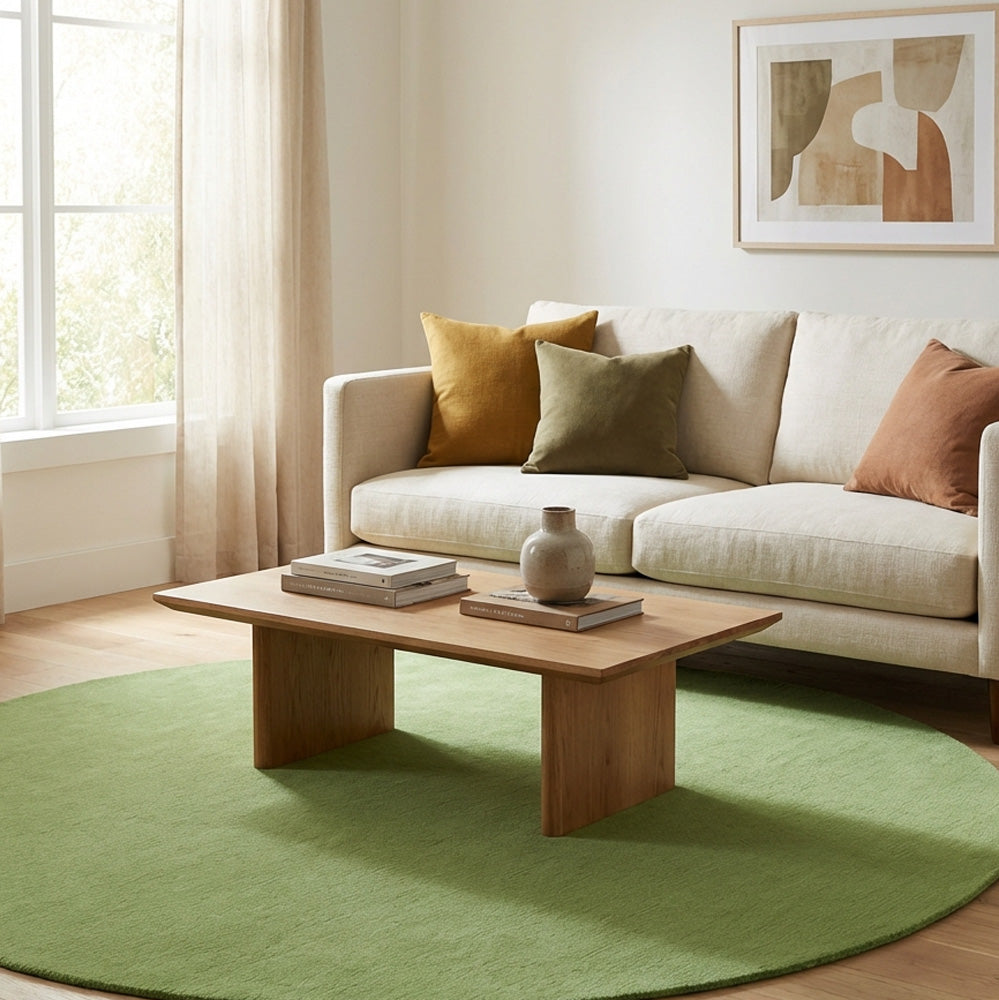 Leaf green round wool rug in modern living room