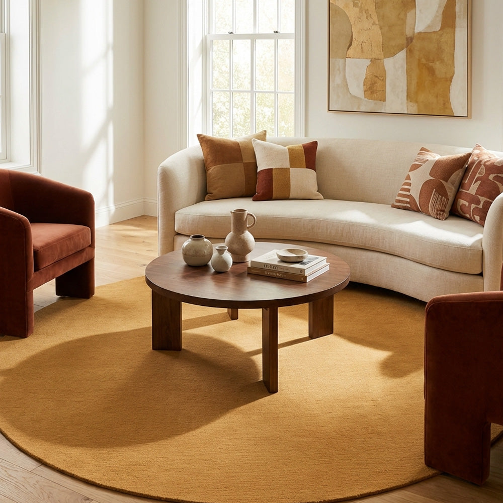 Mustard yellow round wool rug in living room