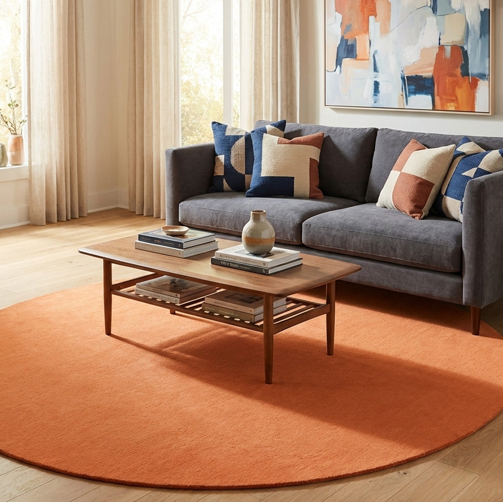 Orange round wool rug in modern living room