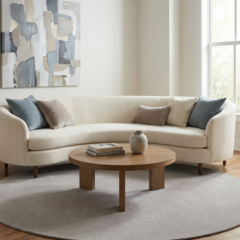 Light grey round wool rug in living room