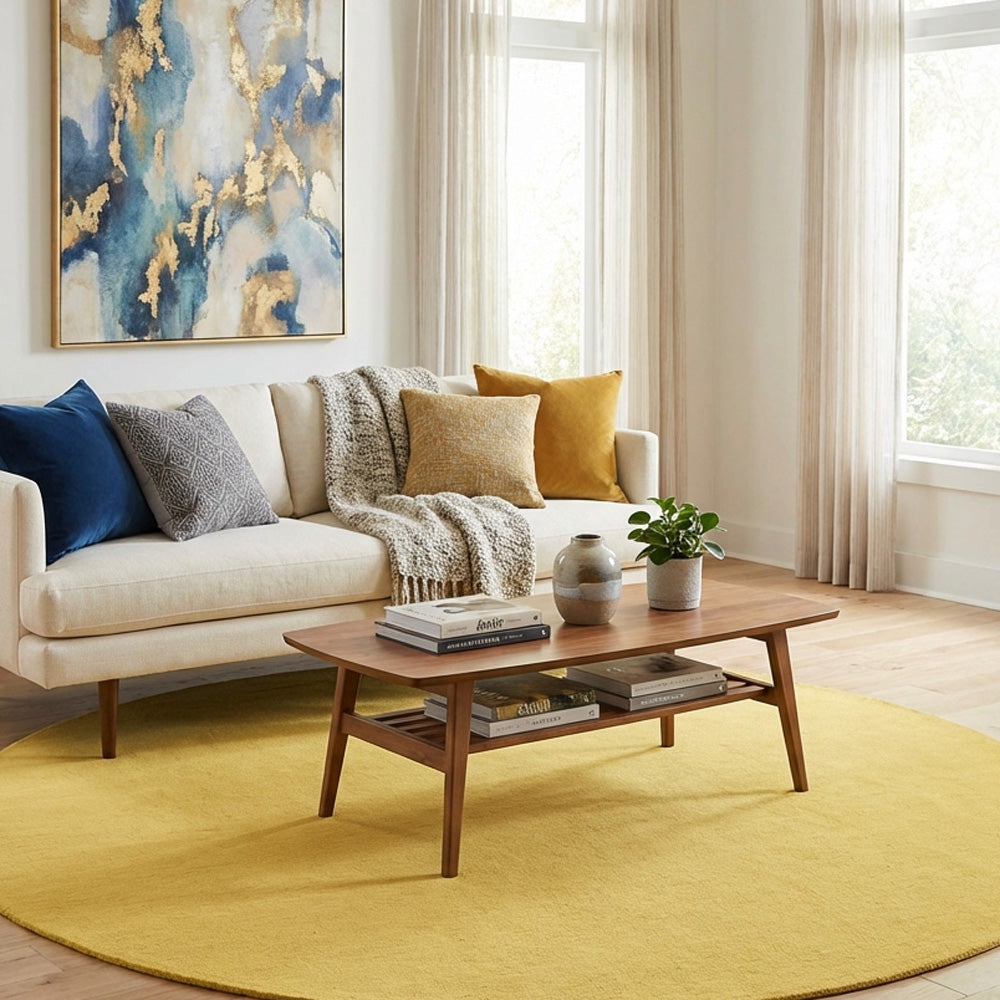 Yellow round wool rug in living room