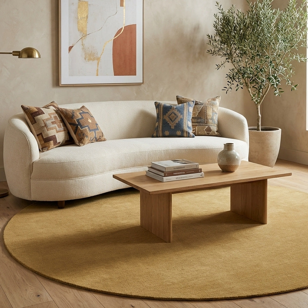 Beige round wool rug in classic living room