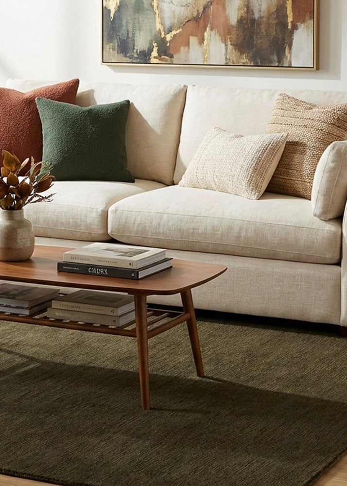 Dark olive green wool rug in living room