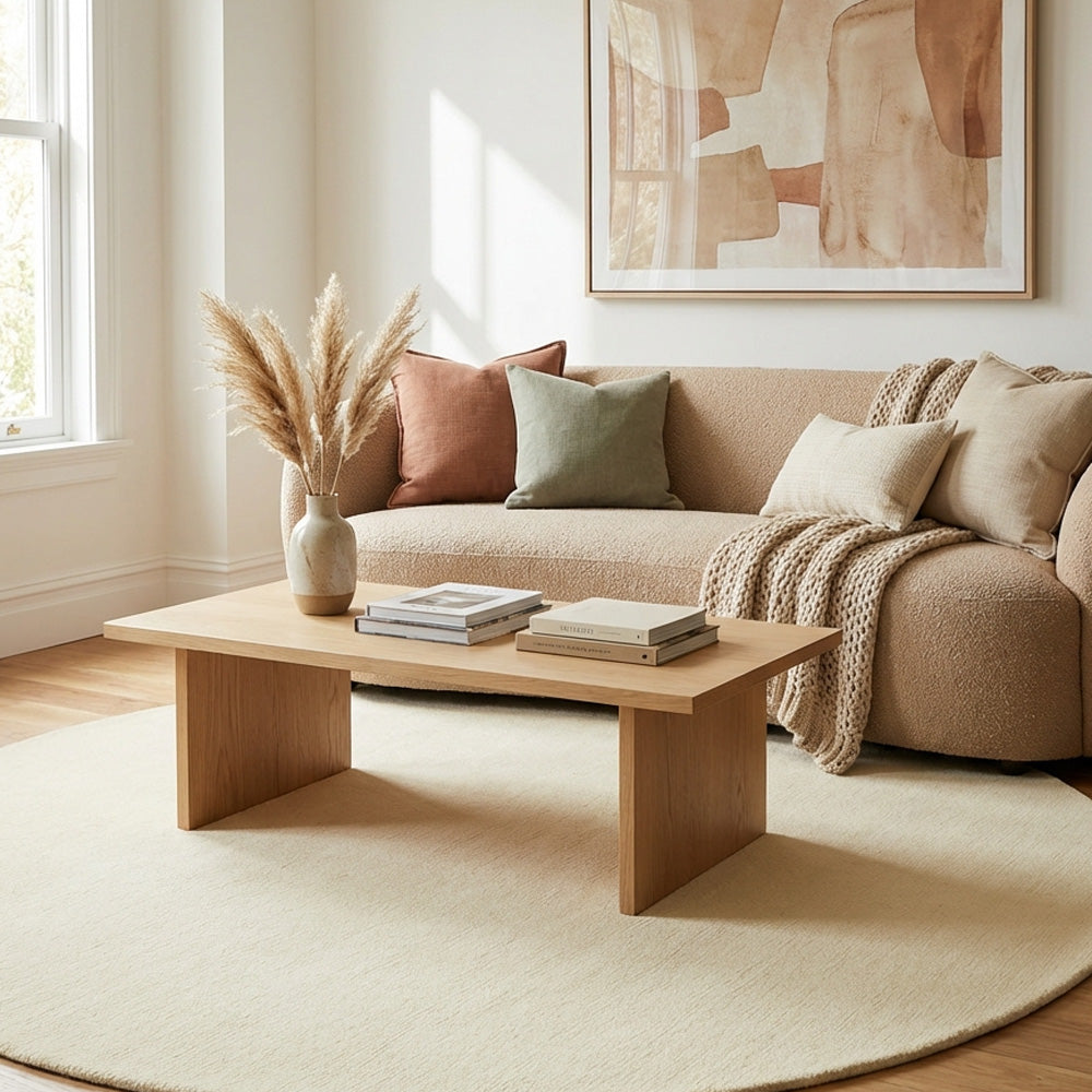 Off white round wool rug in living room