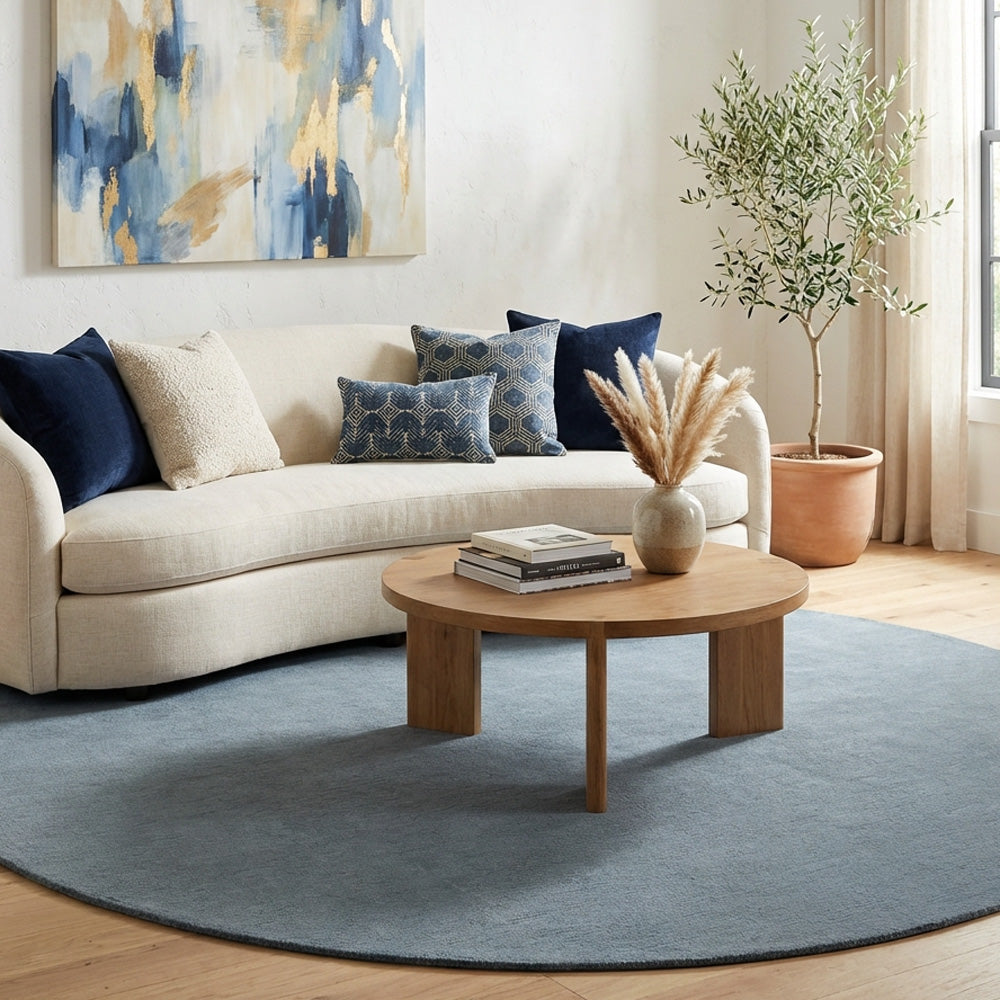 Grey round wool rug in modern living room