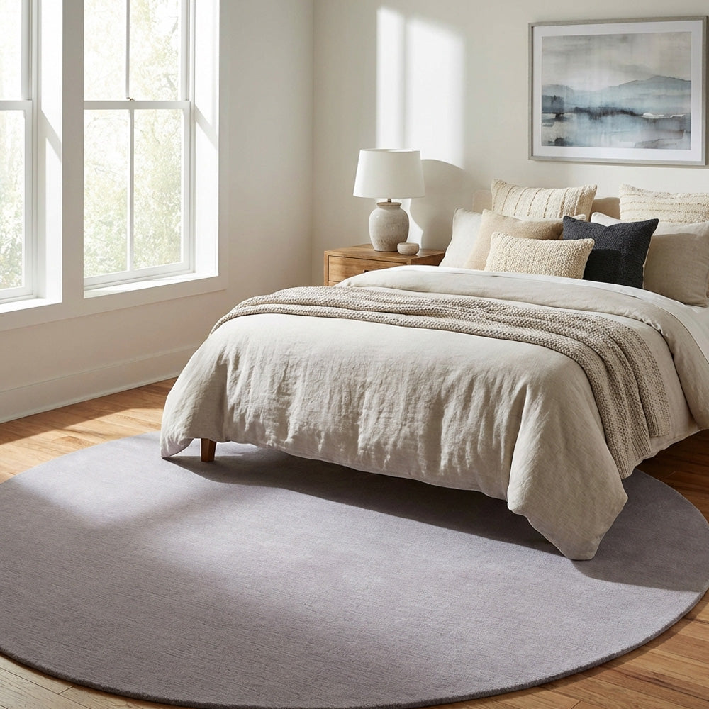 Light purple round wool rug in modern bedroom