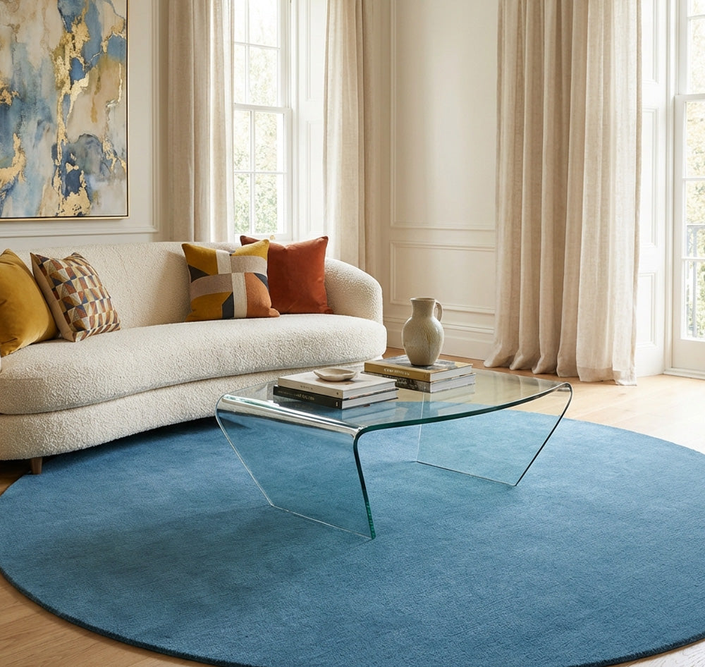 Sky blue round wool rug in modern living room