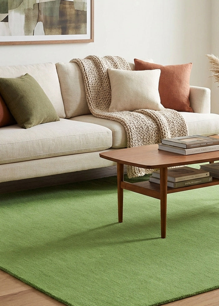 Hand tufted green wool rug in modern living room