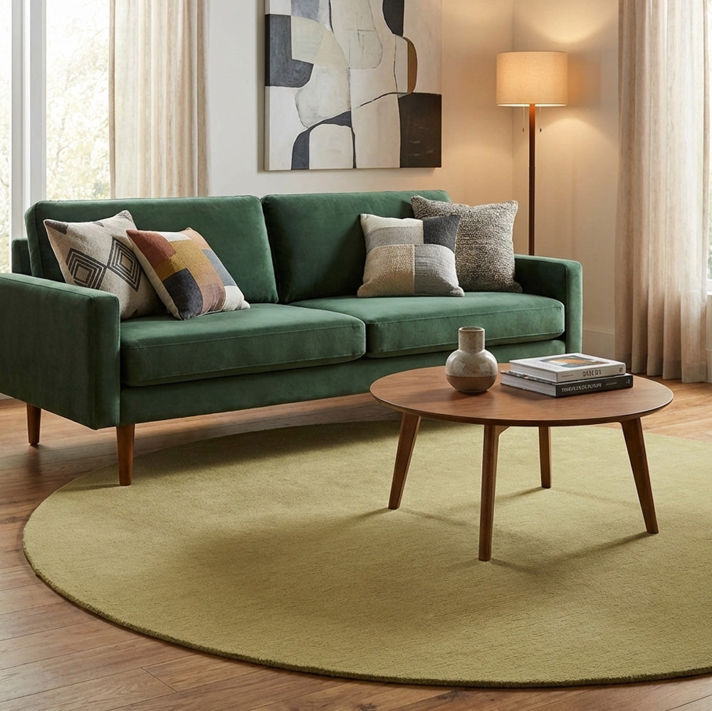 Olive green round wool rug in living room