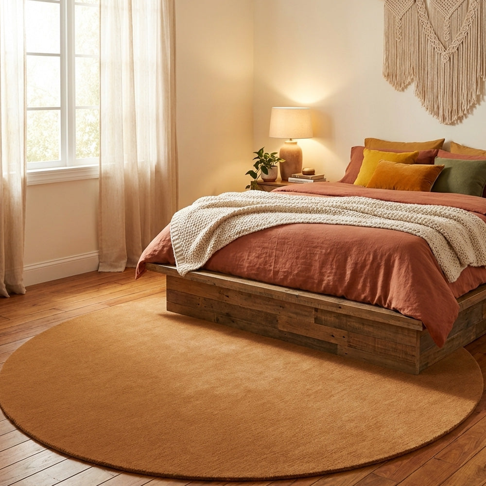 Hand tufted deep orange round wool rug in classic bedroom
