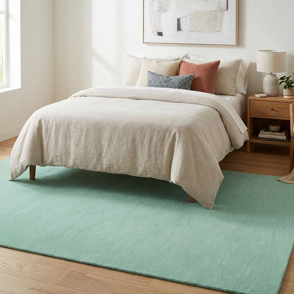 sky blue wool rug in bedroom