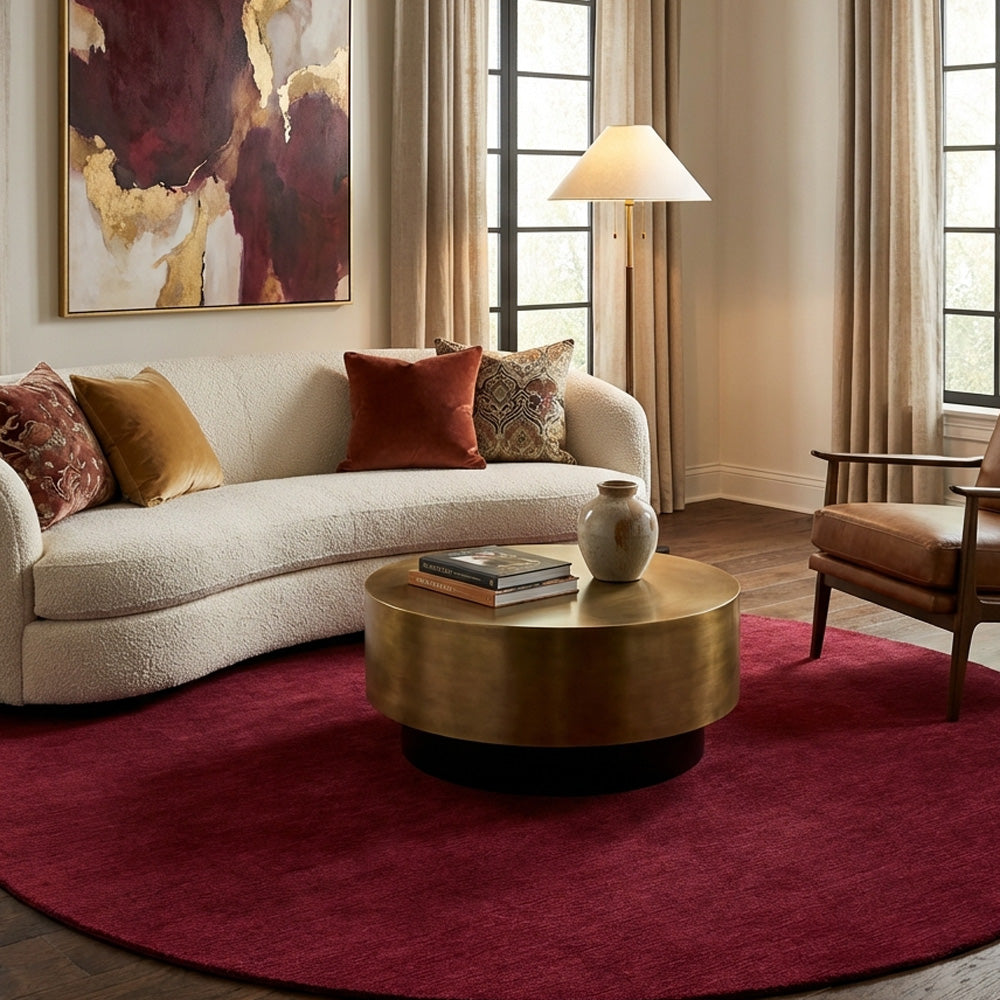 Red round wool rug in modern style living room