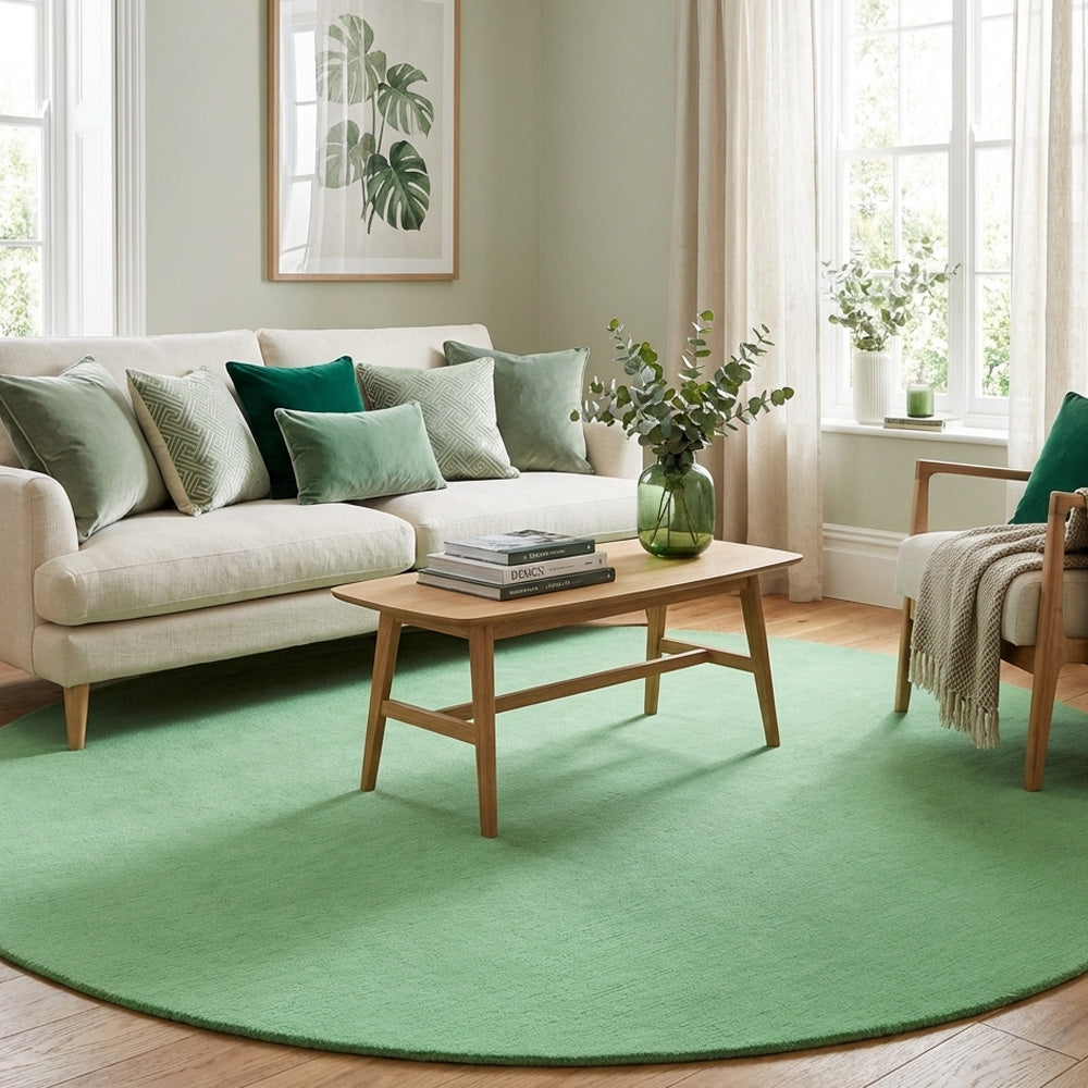 Green round wool rug in living room
