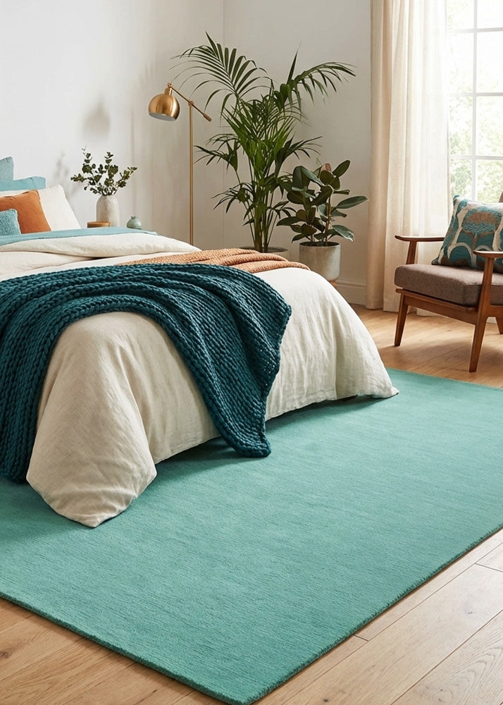 Turquoise wool rug in modern bedroom