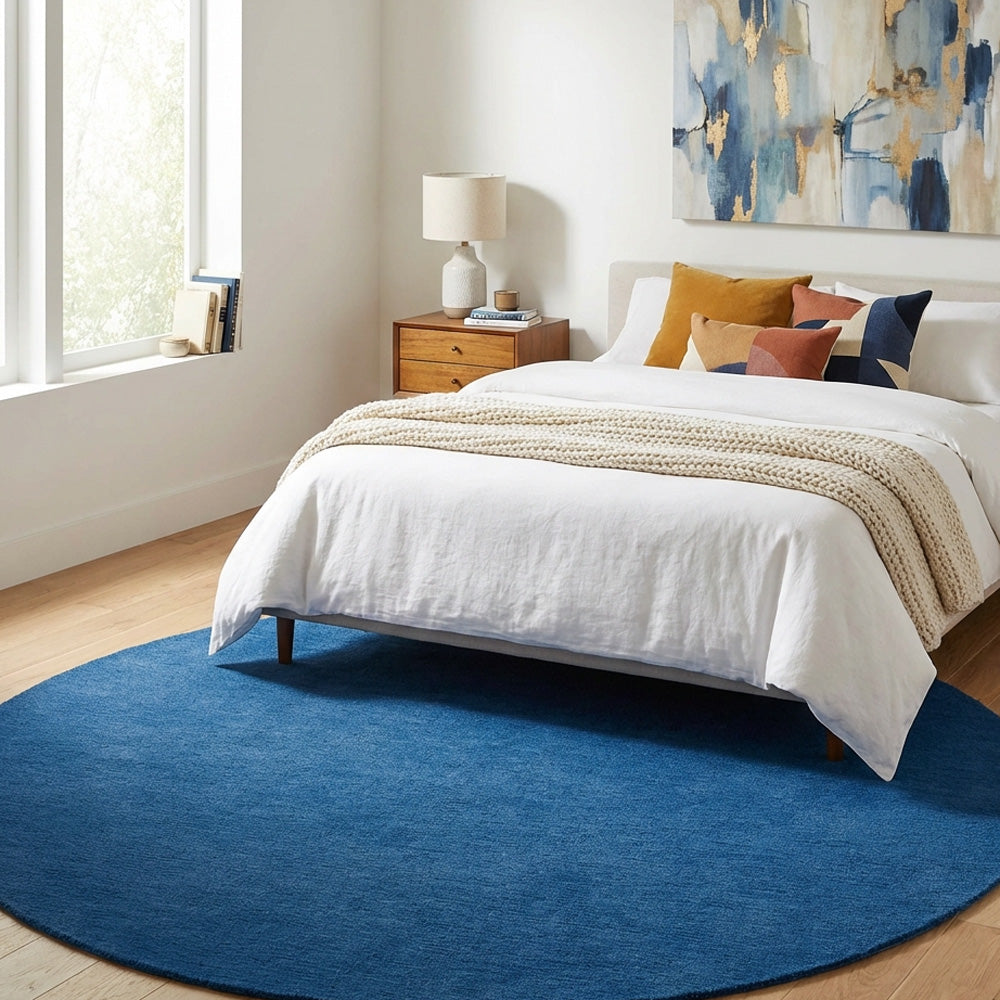 Neon blue round wool rug in modern bedroom