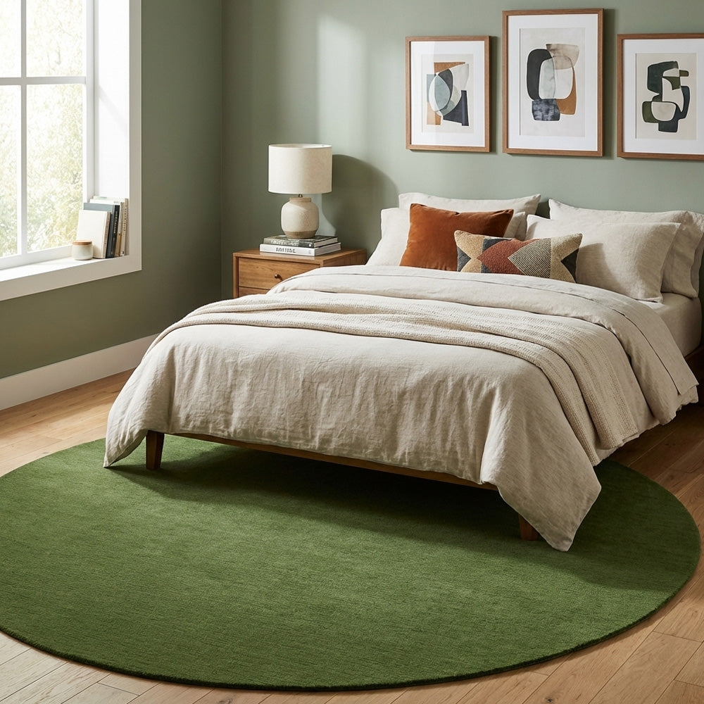 Green round wool rug in modern bedroom