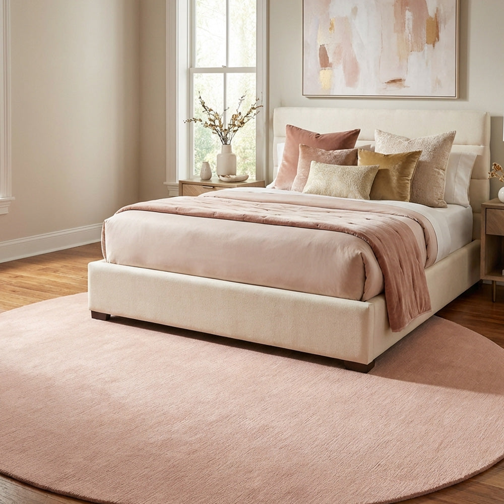 Baby pink round wool rug in modern style bedroom