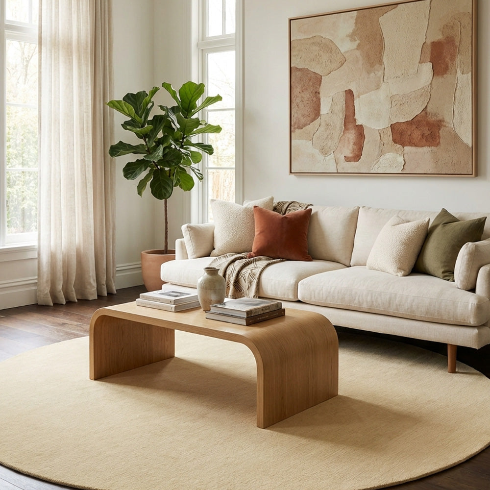 Cream round wool rug in modern living room