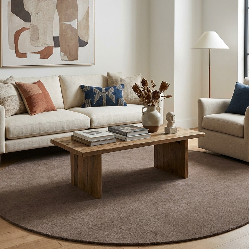 brown round wool rug in modern living room