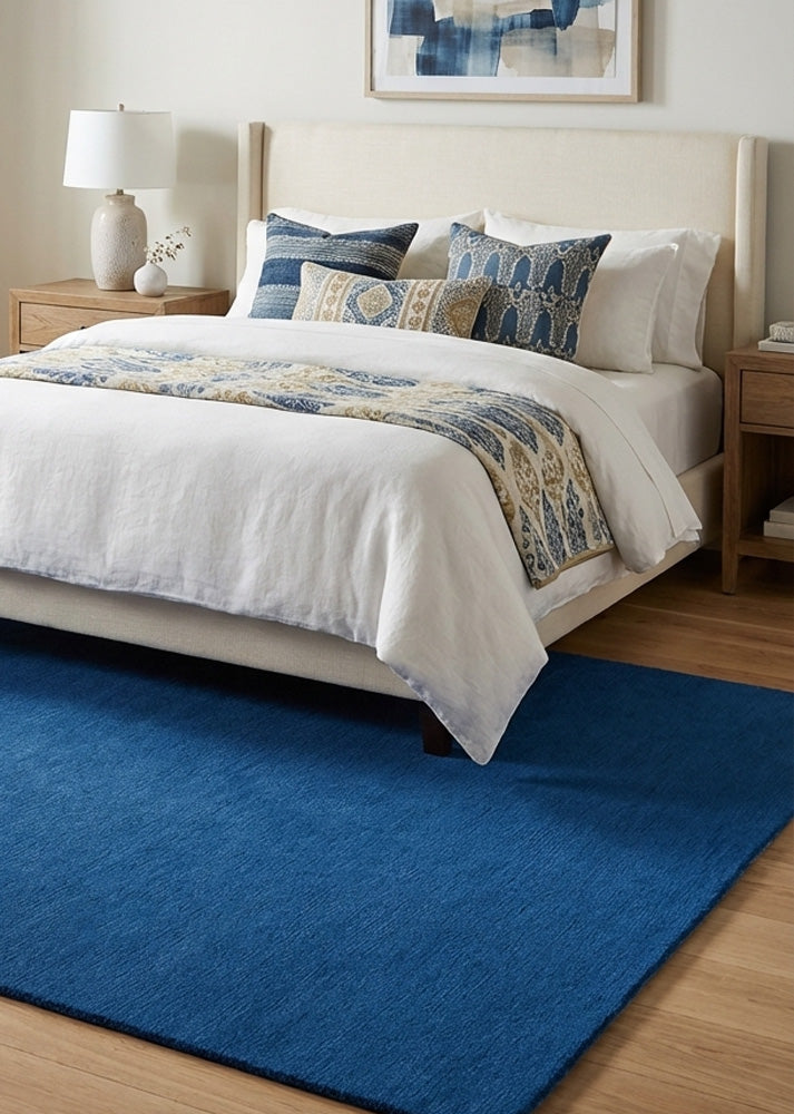blue wool rug in bedroom