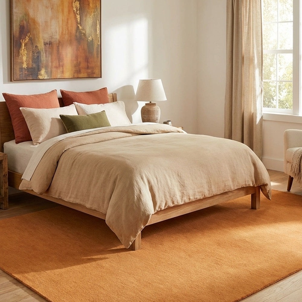 burnt orange wool rug in modern bedroom