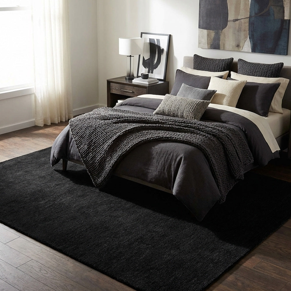 black wool rug in modern bedroom