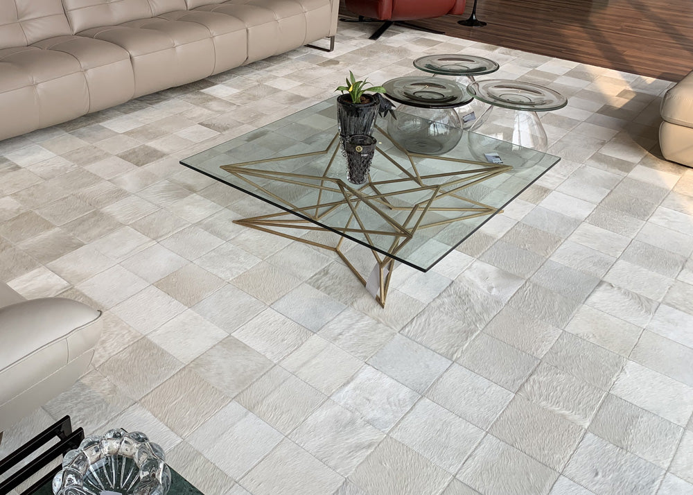 natural brown off white cowhide patchwork rug living room