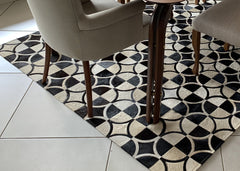 beige and black cowhide patchwork rug handmade