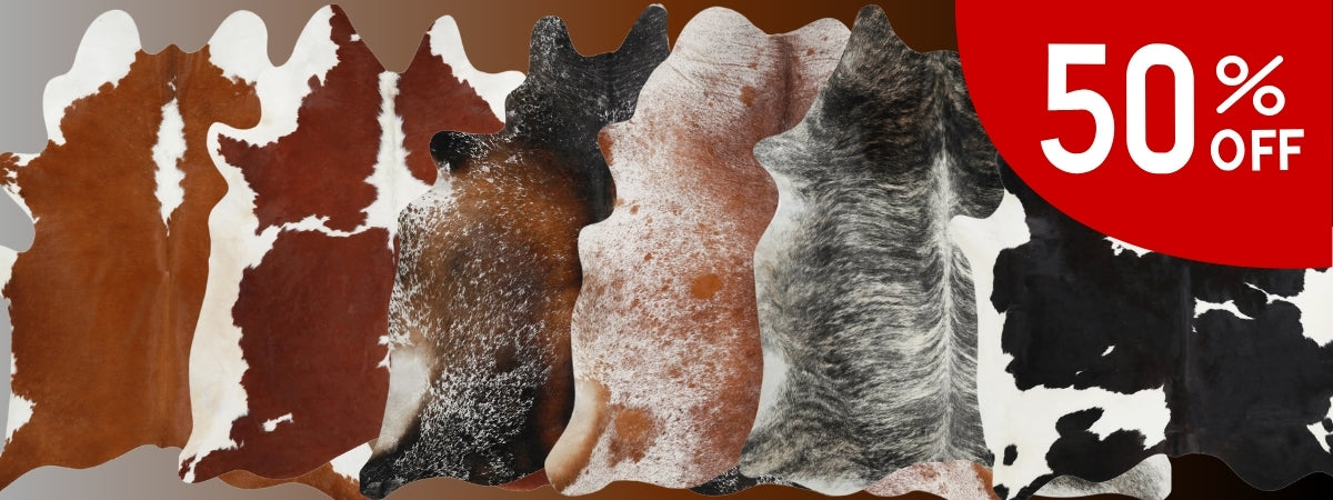 Cowhide rugs in various patterns with a 50% off label on a brown background