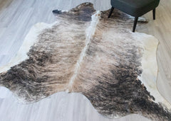 Brown and beige cowskin rug