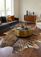 Dark tan tiger print cowhide rug with black animal print pattern